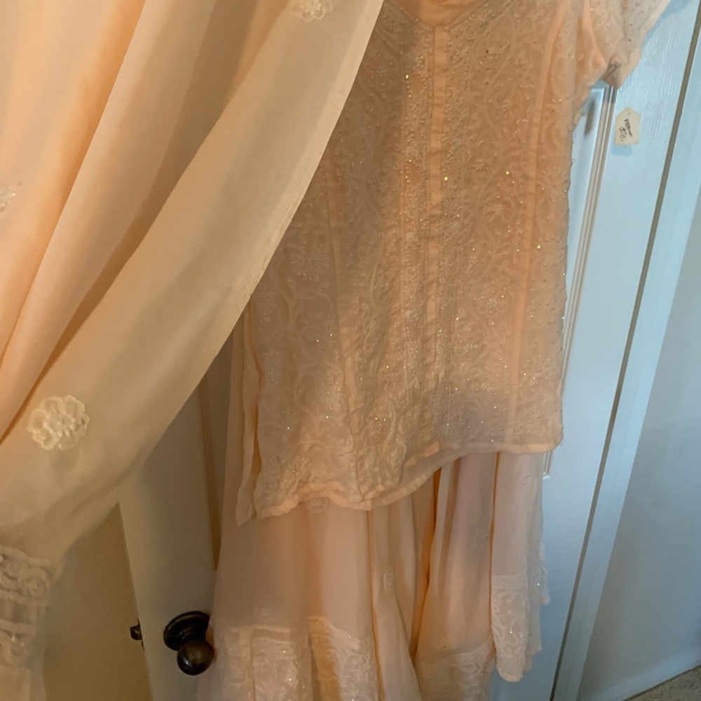 High low skirt with matching blouse and shawl.